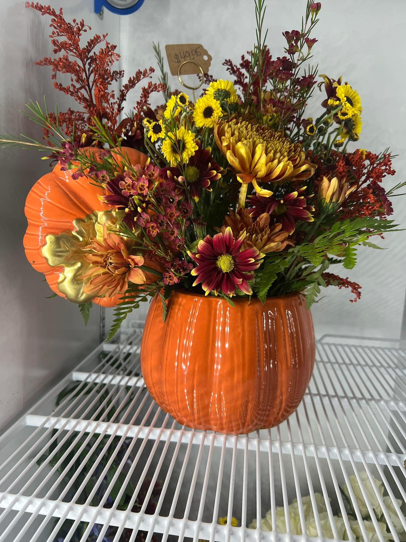 orange jar flowers.jpeg